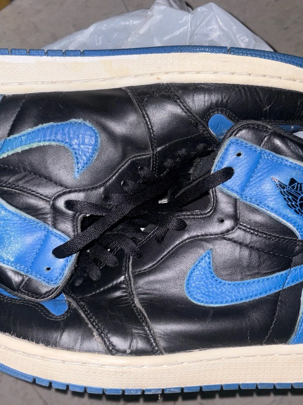 Jordan Men’s High-Top Sneakers in Black and Blue